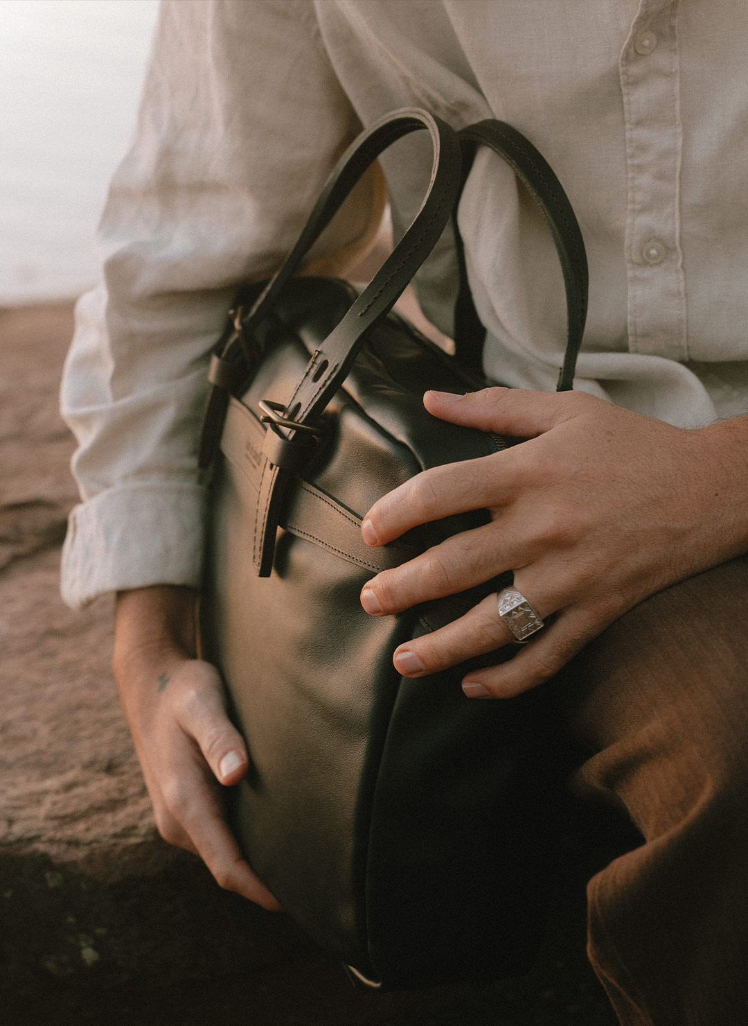 Close-up photo of the smooth leather on the Ledger Business Bag