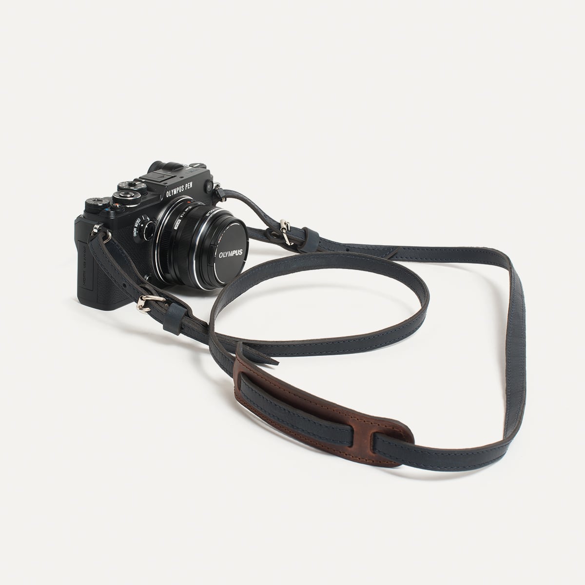 Camera with shoulder strap