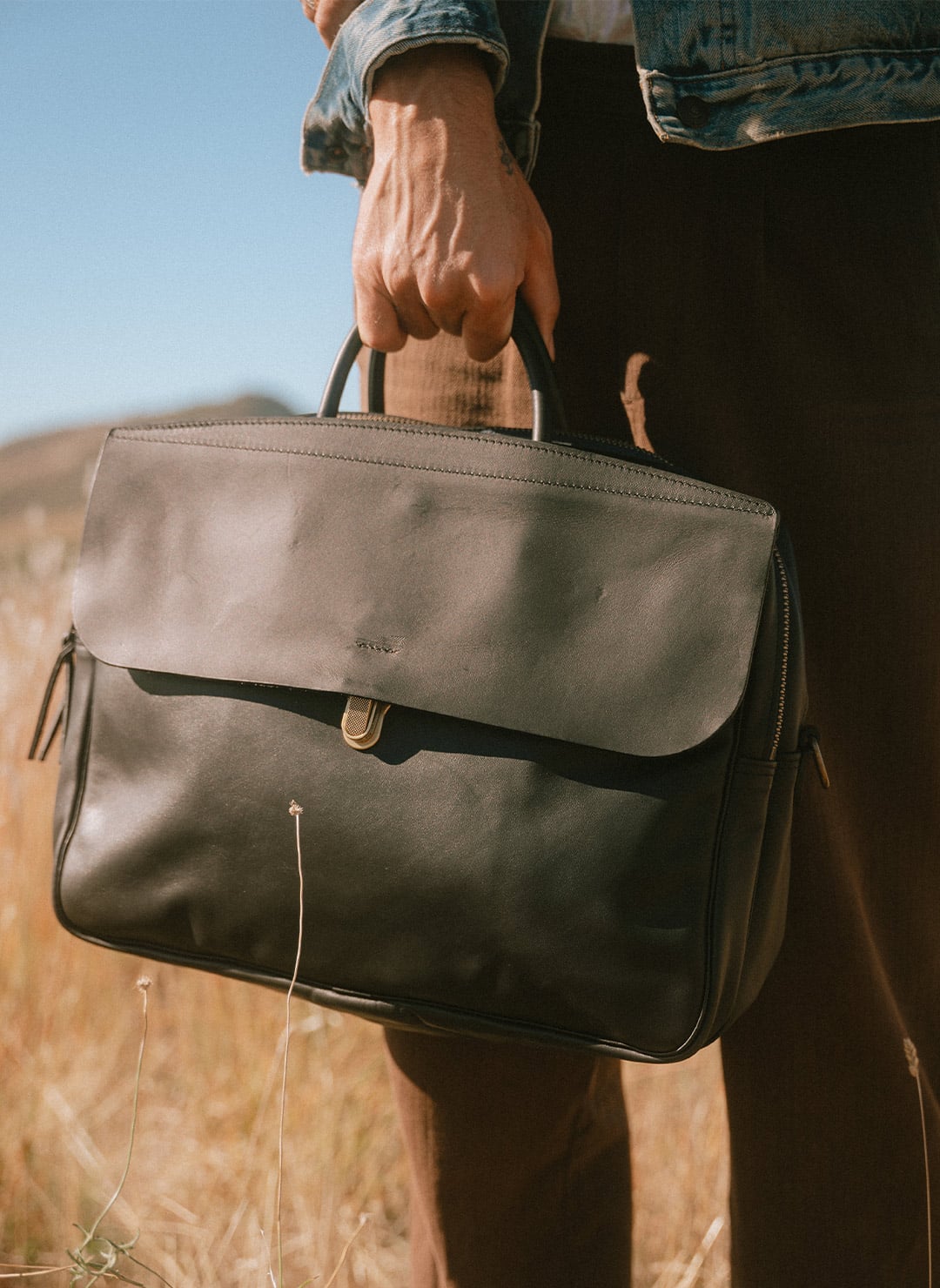 Durable men's leather laptop bag.